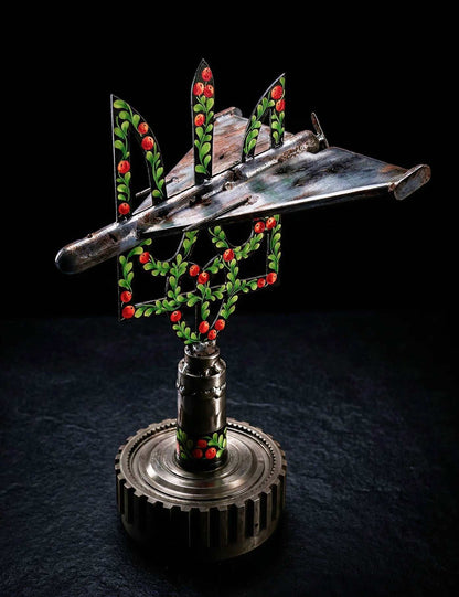 Shahed drone sculpture impaled on Tryzub artwork by Hisoshi Art Studio and Catherine Ruban
