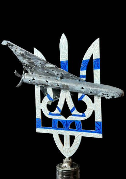 Shahed drone impaled on Tryzub sculpture standing on Gepard shell artwork