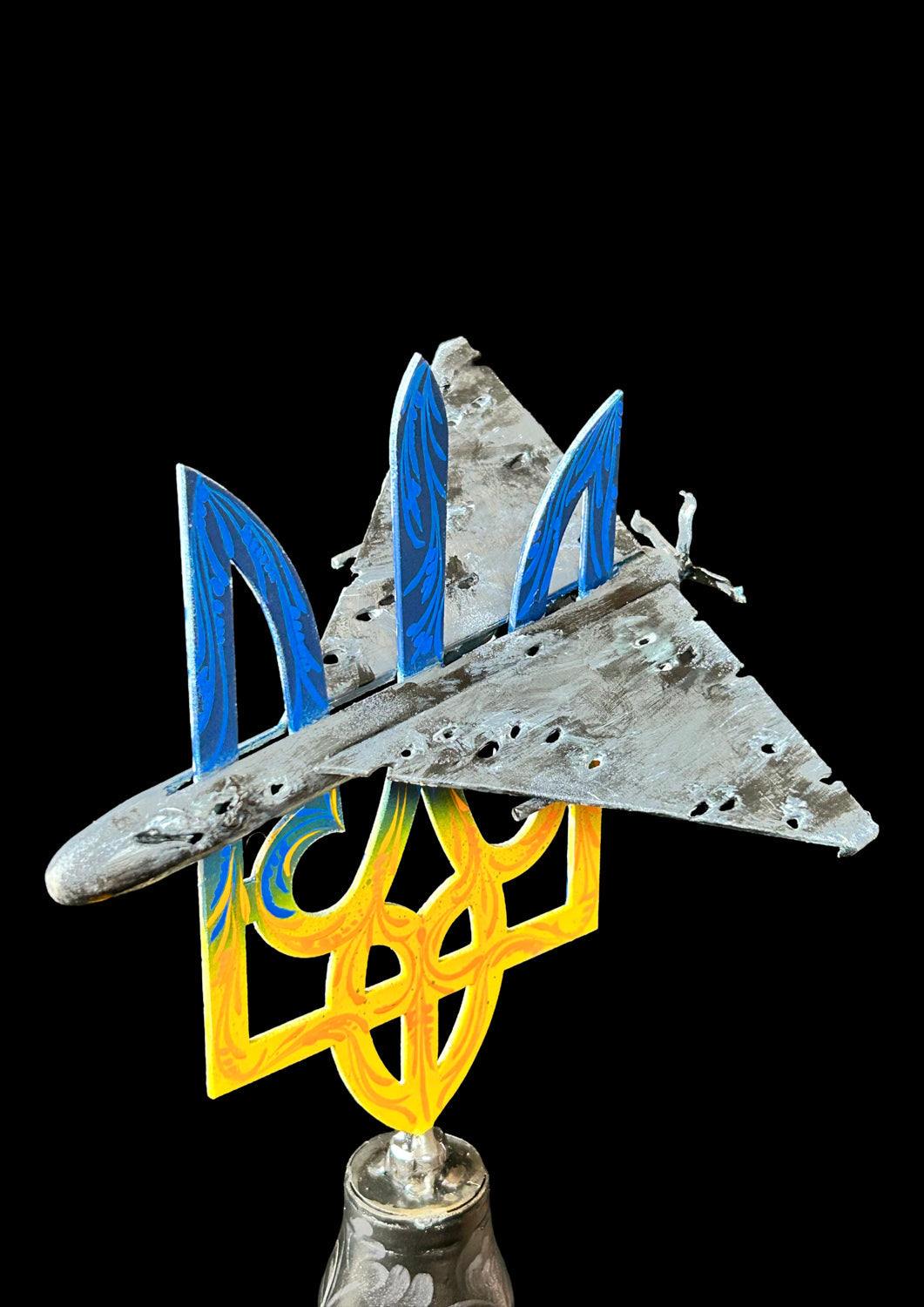 Shahed impaled on Ukrainian Tryzub mounted on a Gepard shell artwork