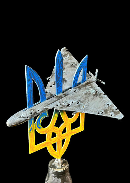 Shahed impaled on Ukrainian Tryzub mounted on a Gepard shell artwork