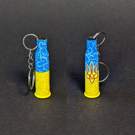 Small caliber keychain painted with Ukrainian flag colors