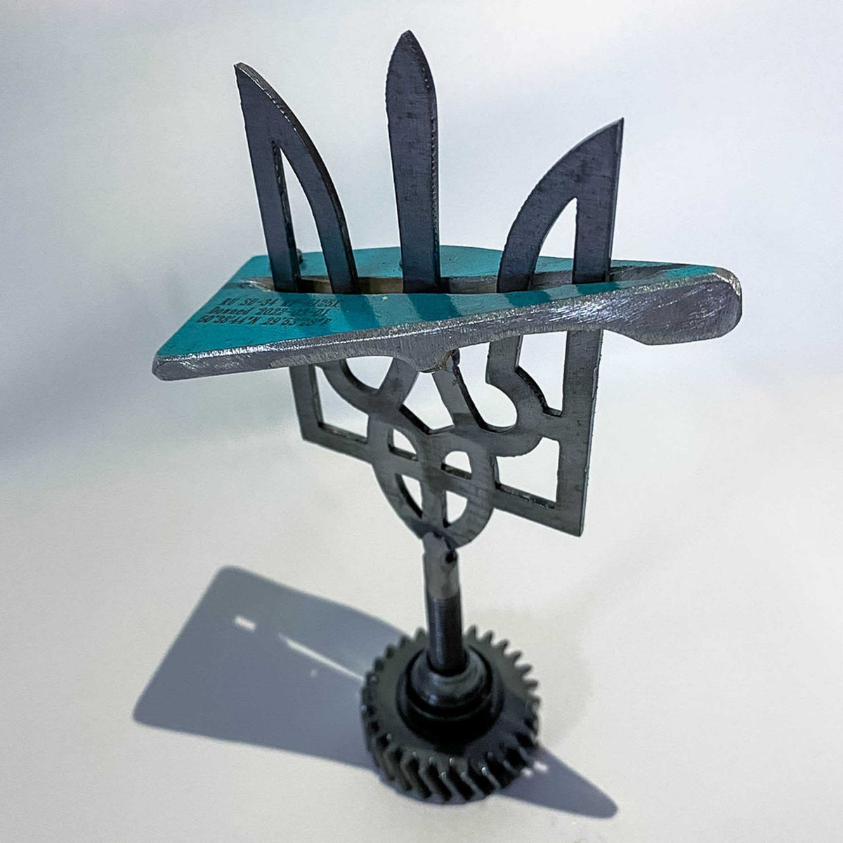 Small Tryzub 14cm with engraved piece of downed Russian Su-34 fighter-bomber on Ukrainian Coat of Arms pedestal