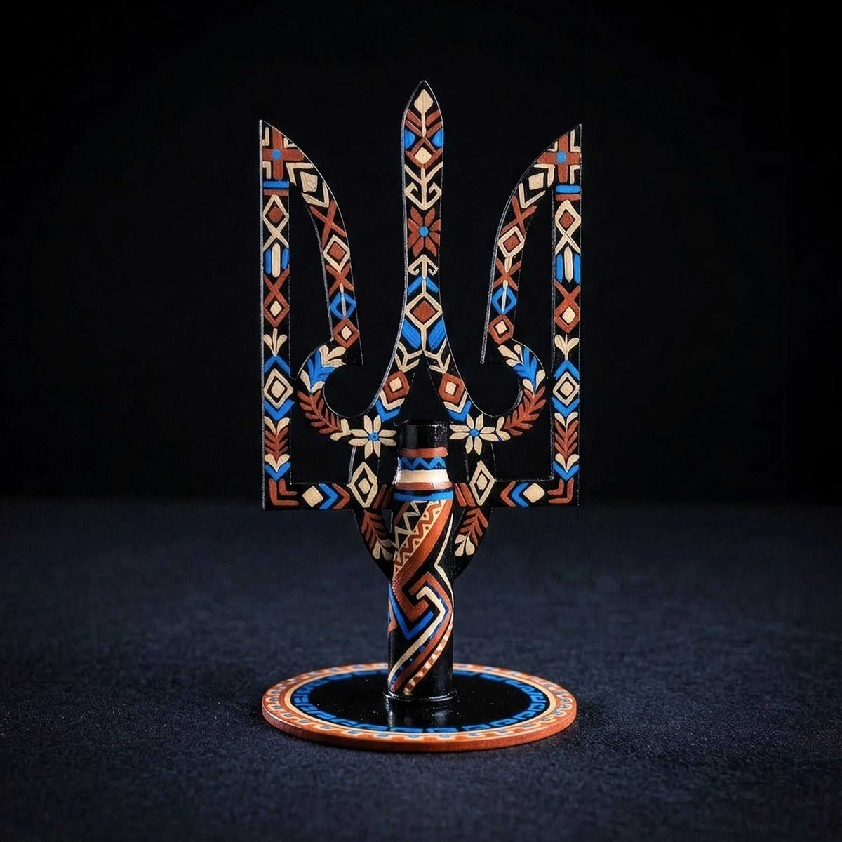 Small tryzub with bullet cartridge artwork by Catherine Ruban