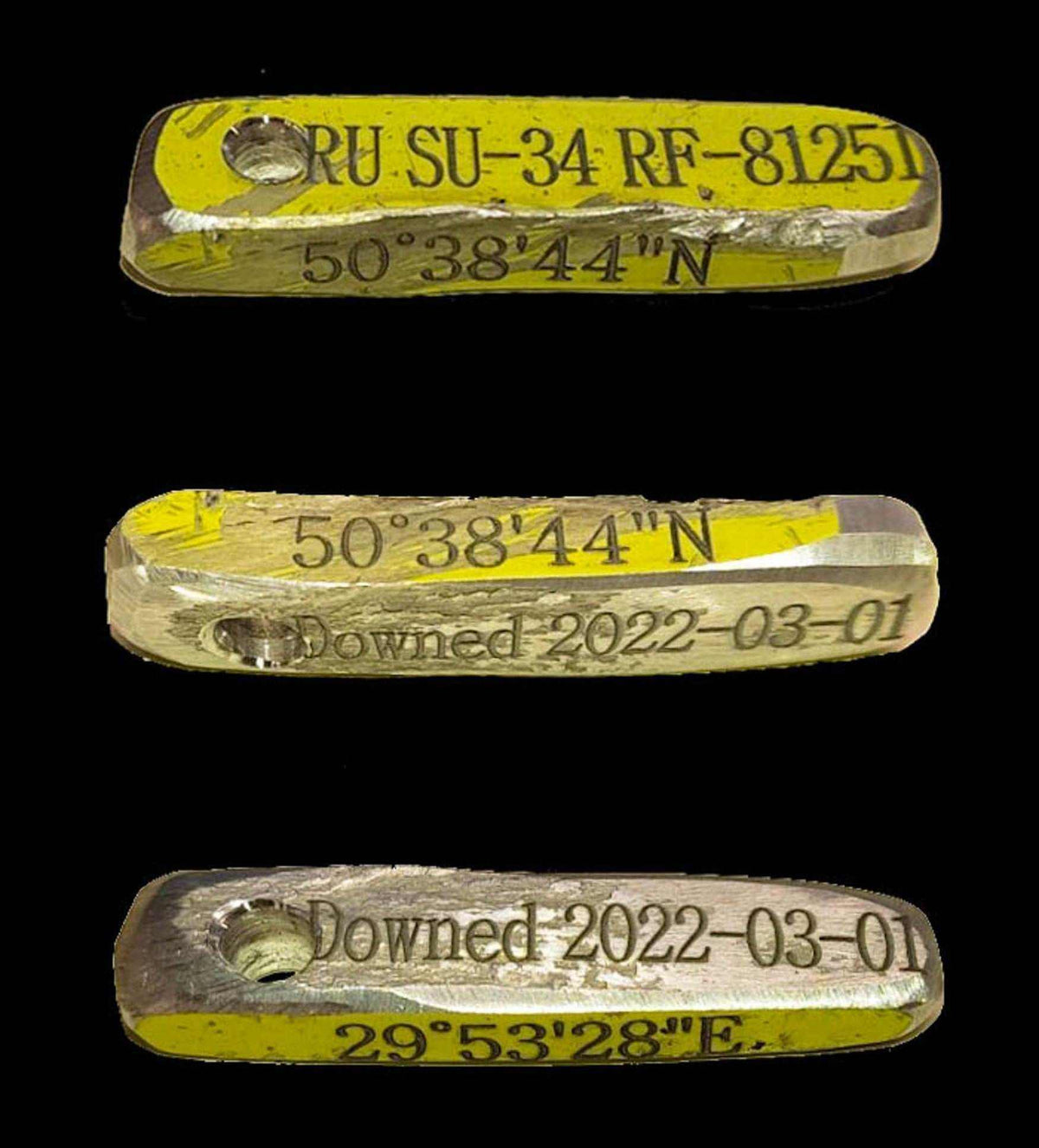 Detailed SU-34 RF-81251 keychain engraved with crash coordinates and aircraft details, approximately 4cm long