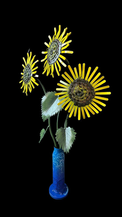 Sunflowers arranged in a Gepard shell vase designed by Hisoshi Art Studio and painted by Anastasia Leonova.