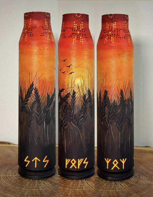 Sunset wheat field with runic protection painted on Gepard shell