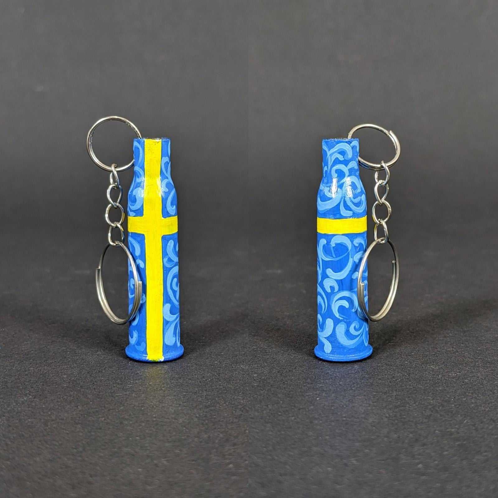 Sweden small caliber keychain painted in Swedish flag colors