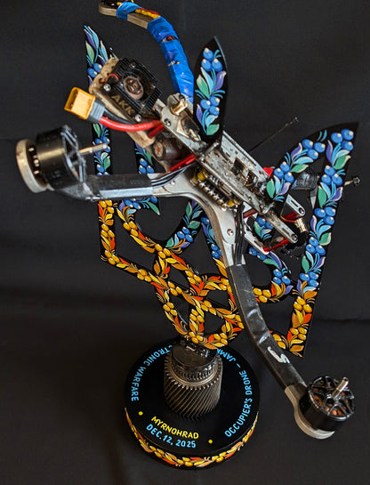 Downed russian drone impaled on Tryzub.