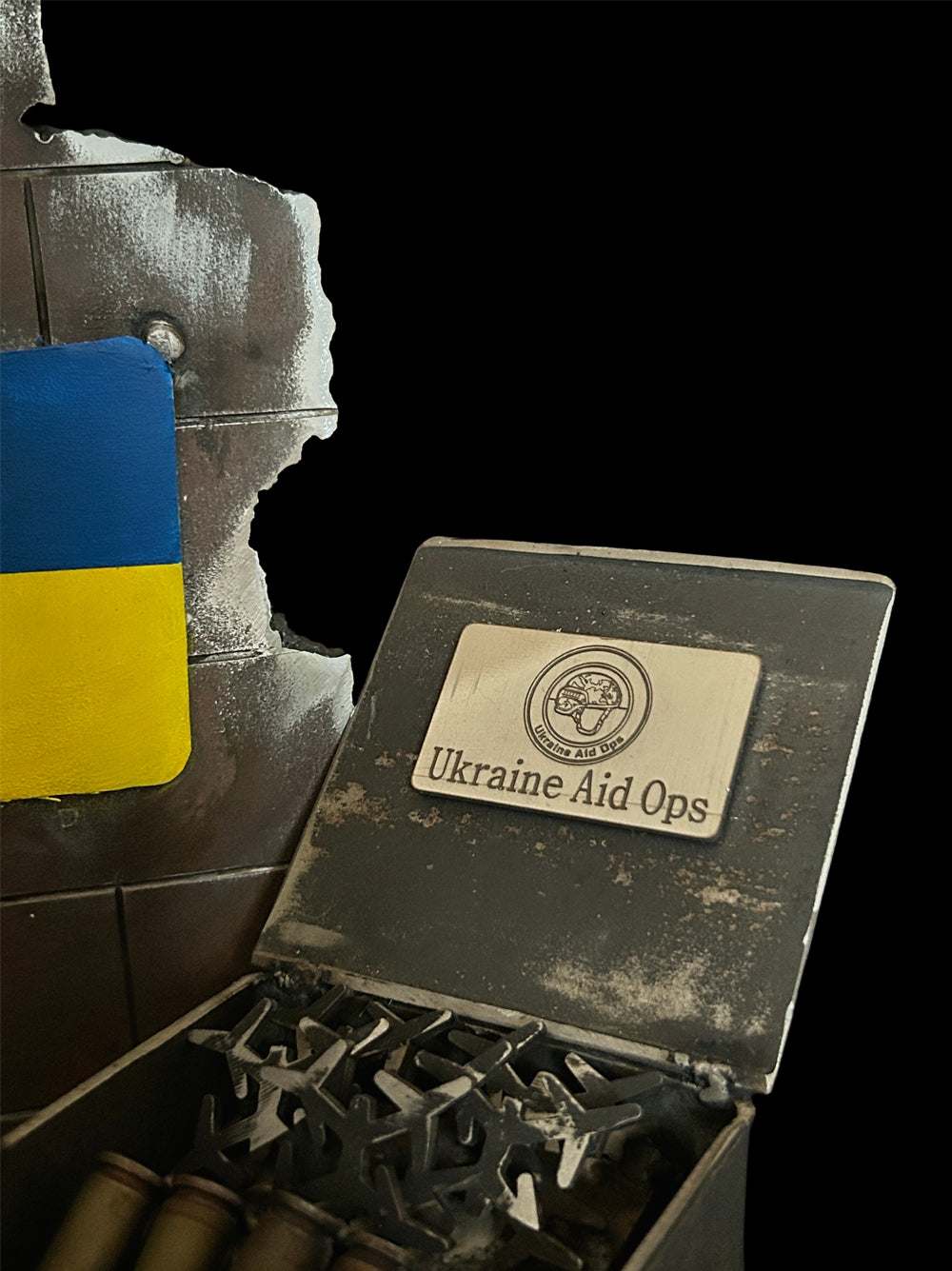 Soldier of Ukraine Aid Ops Special Forces Typhoon receiving drones with engraved propeller and artwork details