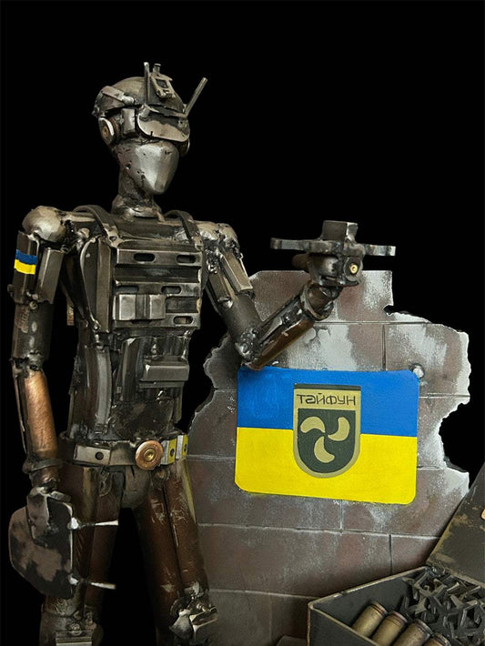 Special Forces soldier from Typhoon receiving drones supplied by Ukraine Aid Ops with propeller from intercepted Russian drone engraved with details