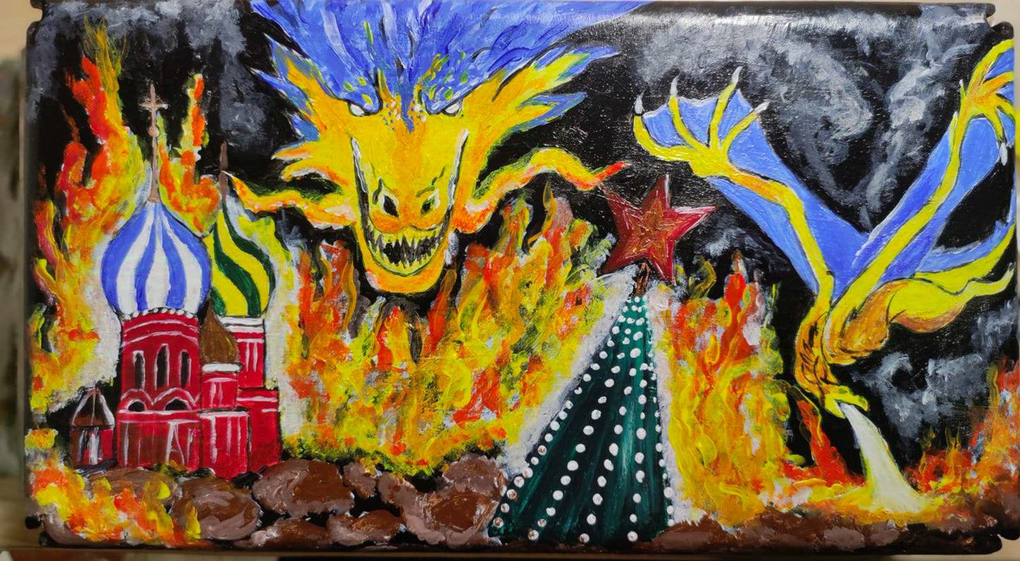 Ukrainian Dragon artwork burning the Kremlin on a tank turret piece painted by a Ukrainian family