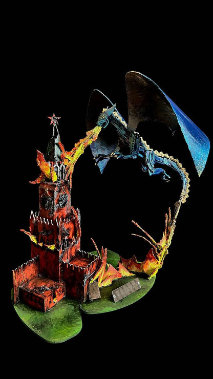 Ukrainian Dragon sculpture burning Kremlin model with grad rocket wings by Hisoshi Art Studio