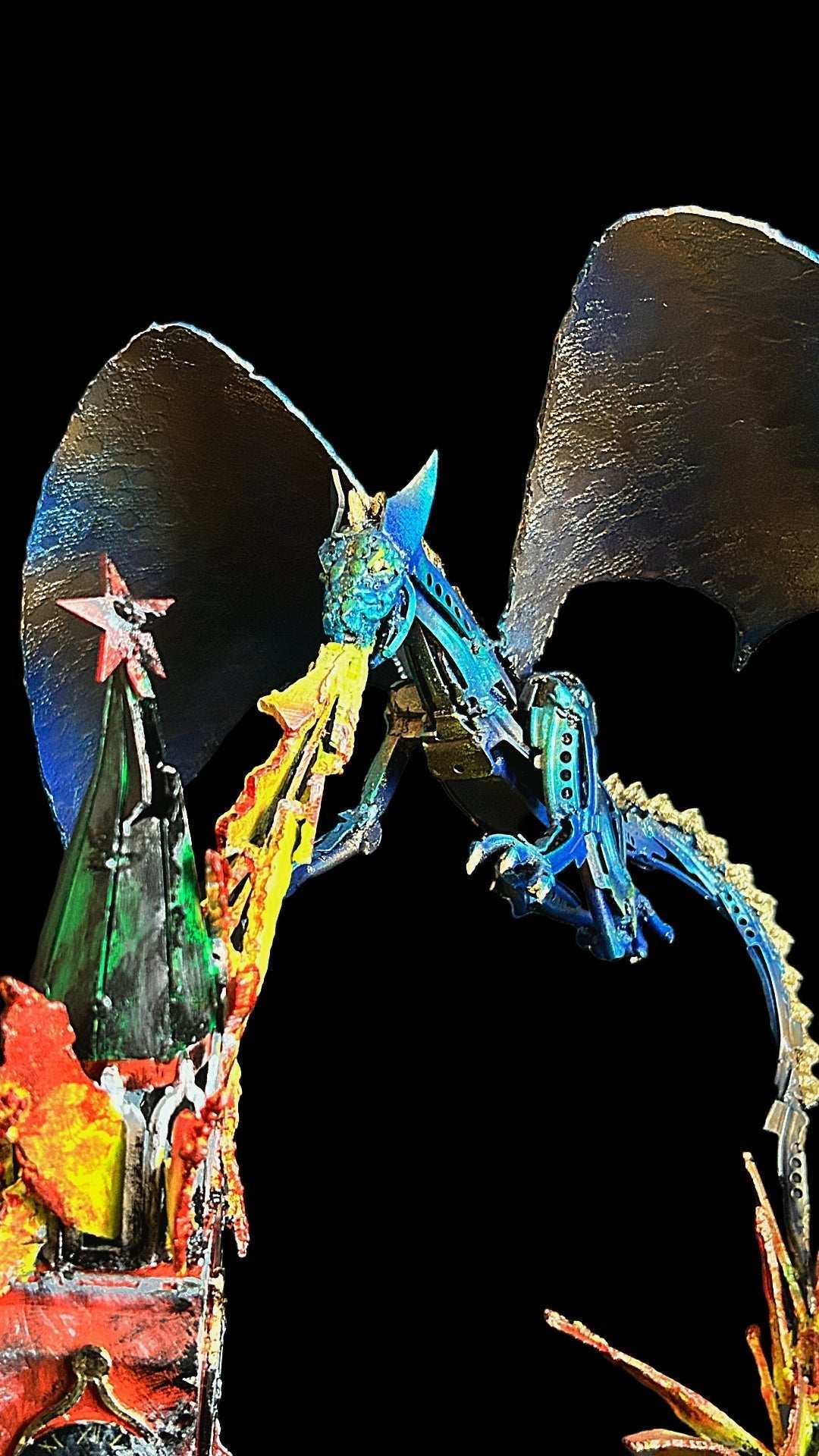 Ukrainian Dragon sculpture burning Kremlin model with rocket wings artwork by Hisoshi Art Studio