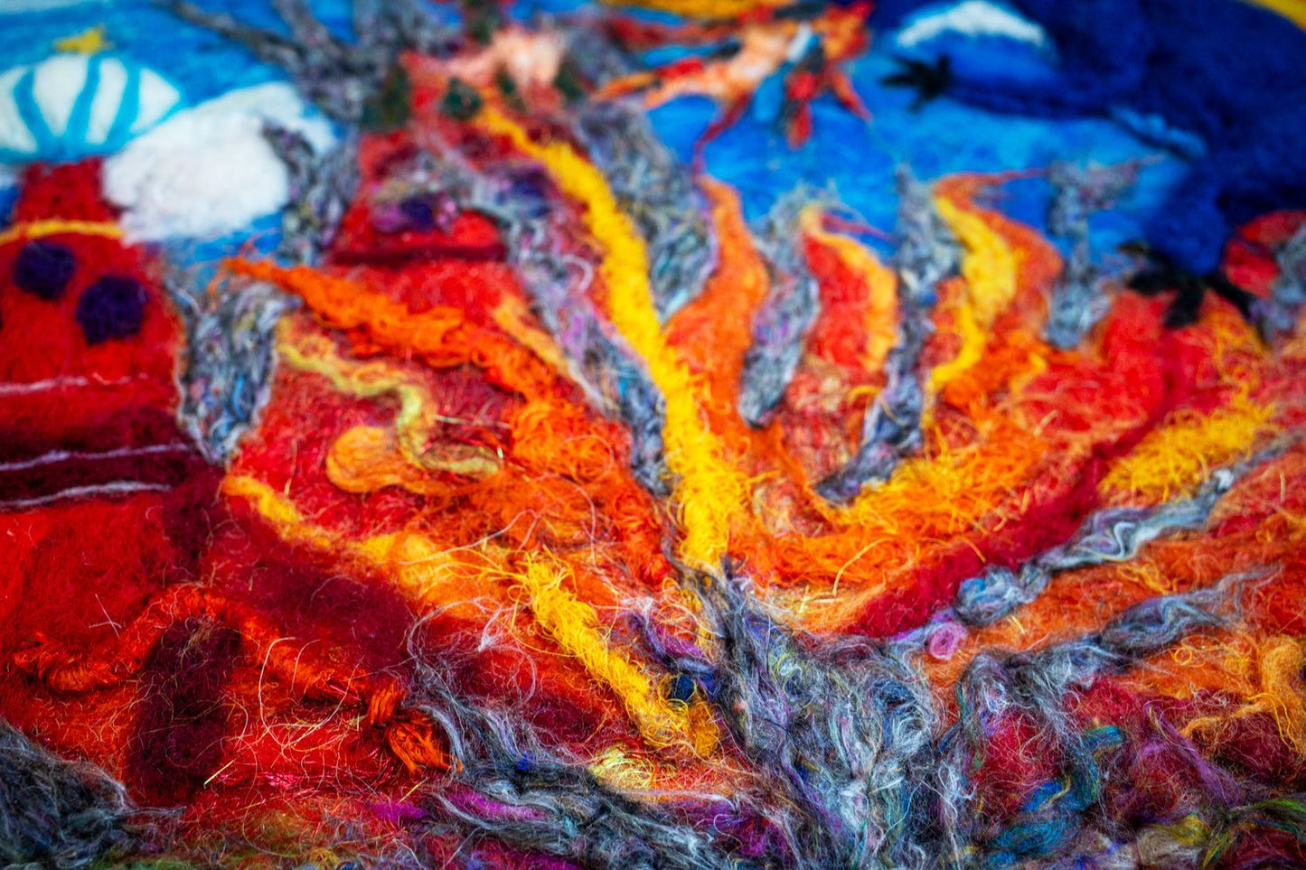 Ukrainian dragon wool artwork burning Kremlin with fletchettes fire on canvas 40x50cm