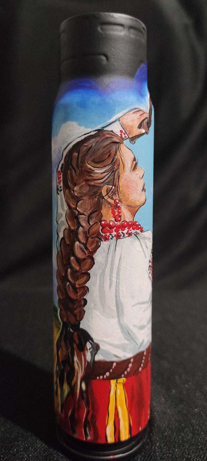 Ukrainian girl in traditional attire hand-drawn on 30mm shell by Tanya Shacun