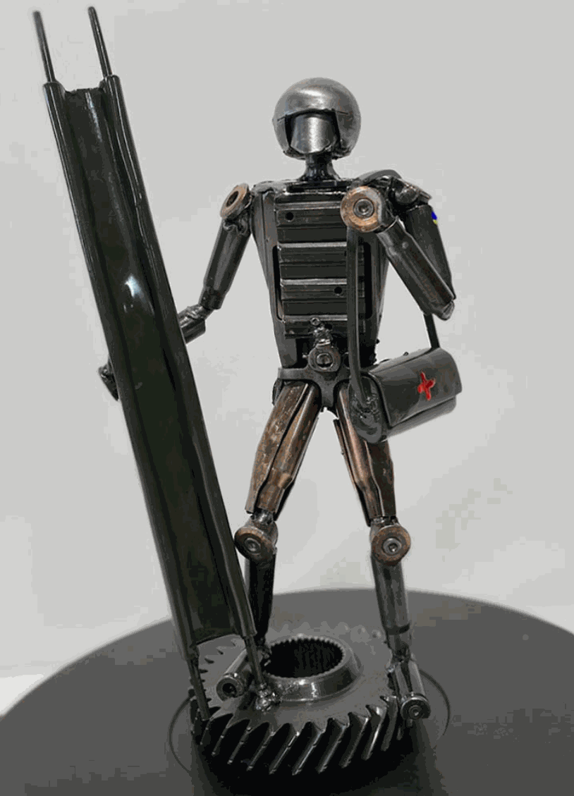 Sculpture of Ukrainian Medic made from frontline shells, 27cm tall, by Hisoshi Art Studio