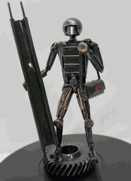 Sculpture of Ukrainian Medic made from frontline shells, 27cm tall, by Hisoshi Art Studio