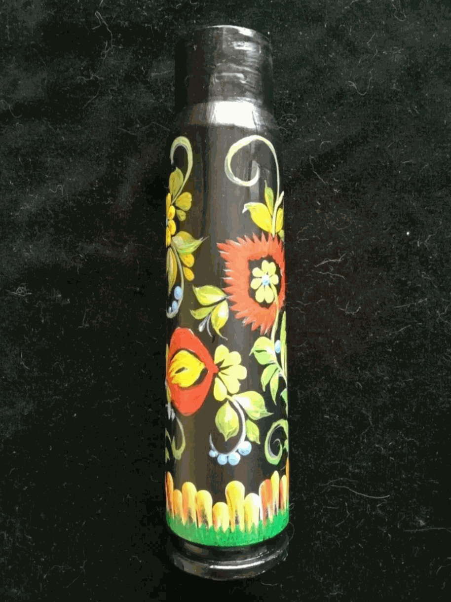 30mm shell with dark hand-painted casing, colourful floral folk-art blooms, swirling vines and a green-and-yellow border; Ukrainian reward system