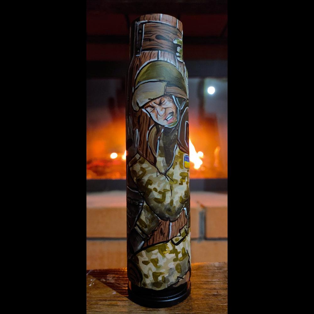Ukrainian Soldier holding back barbarians illustrated on 30mm shell by Tanya Shacun