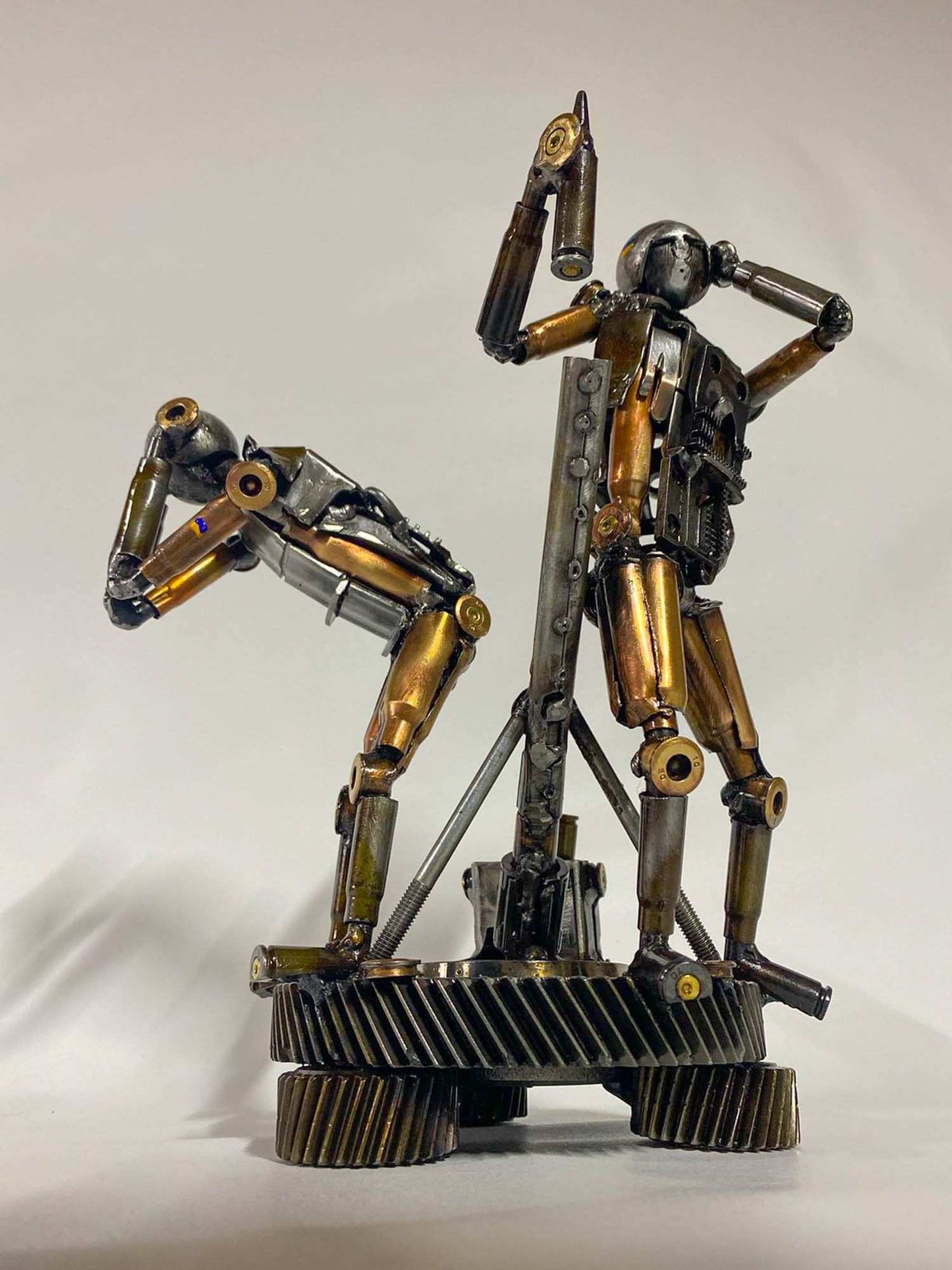 Sculpture of two Ukrainian Soldiers loading a mortar shell by Hisoshi Art Studio
