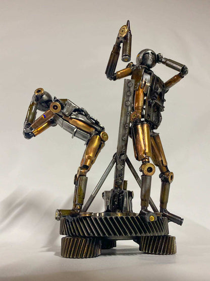 Sculpture of two Ukrainian Soldiers loading a mortar shell by Hisoshi Art Studio
