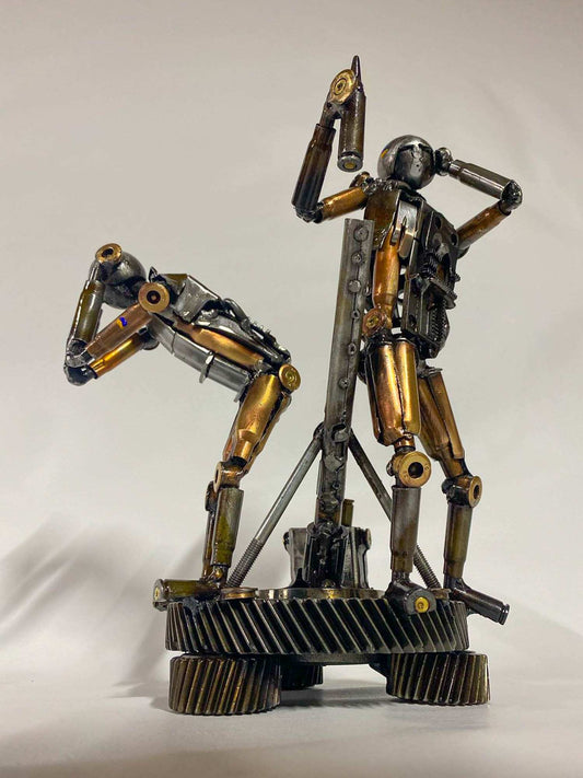 Sculpture of two Ukrainian Soldiers loading a mortar shell by Hisoshi Art Studio