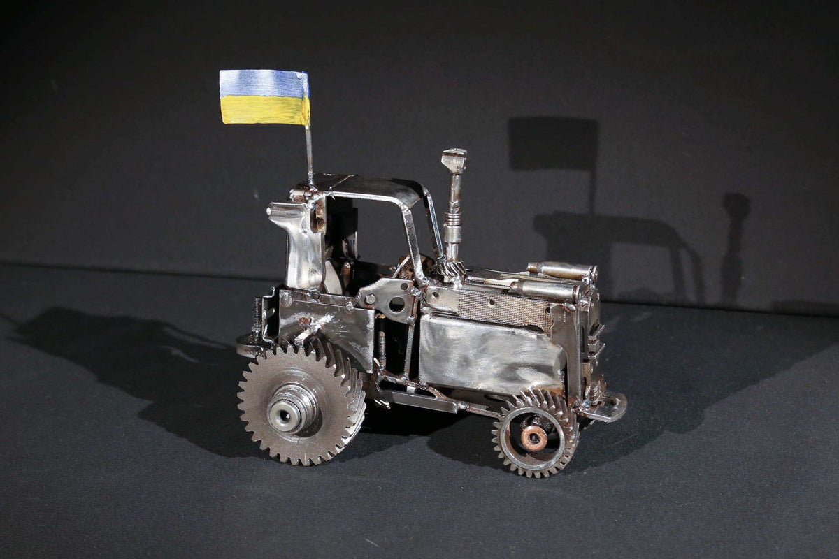 Ukrainian tractor pulling a Russian tank artwork by Hisoshi Art Studio