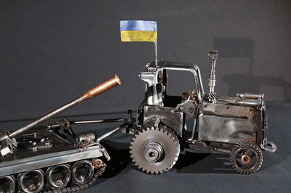 Ukrainian tractor pulling a Russian tank artwork by Hisoshi Art Studio