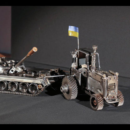 Ukrainian tractor pulling a Russian tank artwork by Hisoshi Art Studio