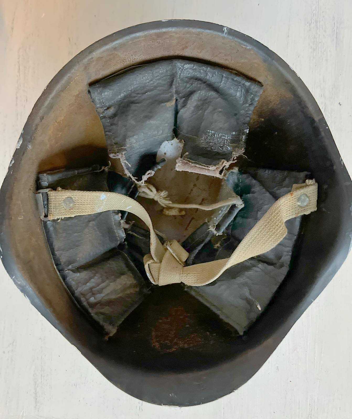 Close-up of 30mm helmet shell with detailed "window view" artwork by Anna Huliaieva