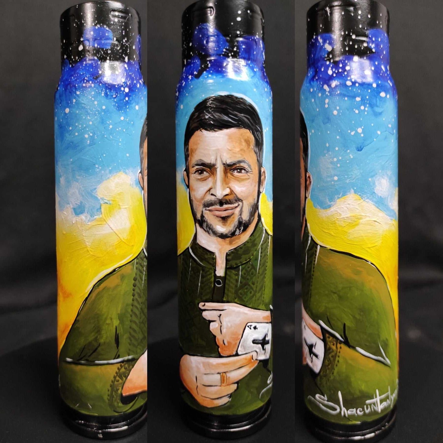 Zelensky pulling an ace of cards painted on a 30mm shell