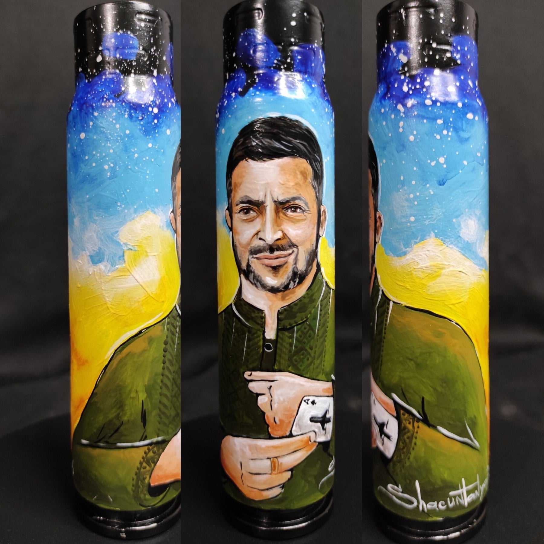 Zelensky pulling an ace of cards painted on a 30mm shell